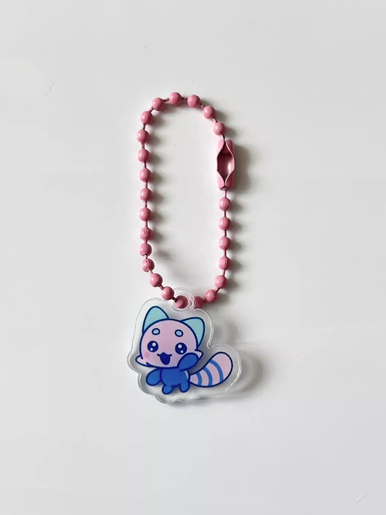 سلسلة معلقة صغيرة أصلية من Tam - مراجعة Bandai Model Tamagotchi وسعره